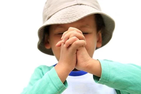 Boy praying stock photo Stock Photos