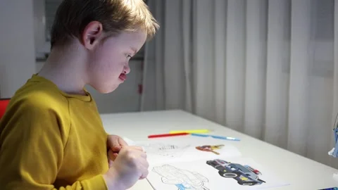 The boy is prepairing to draw Stock Footage 300502496