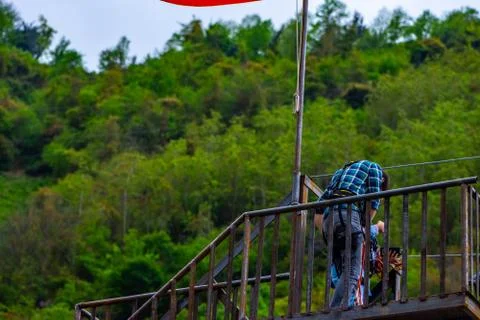 The boy preparing himself for zip line Stock Photos