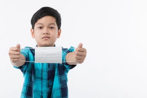 Boy preparing for wearing mask Stock Photos