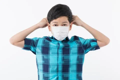 Boy preparing for wearing mask Stock Photos