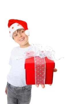 Boy with present looking sideways Foto stock