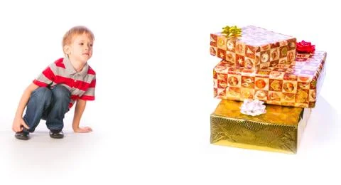 Boy with presents Stock Photos