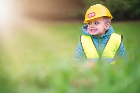 Boy pretending to be a builder foreman Stock Photos