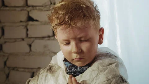 Boy in Protective Suit Counting Fingers Inside Abandoned Building Video stock 329464072