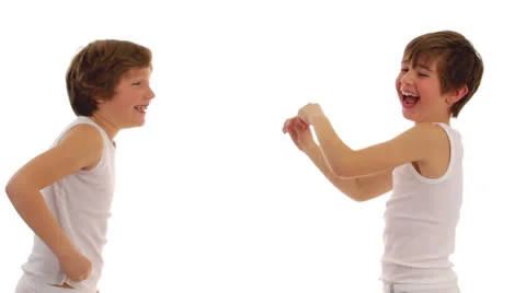 Boy pulling another boy a tooth Stock Footage 24631014