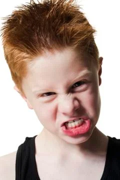 Boy pulling funny face Stock Photos