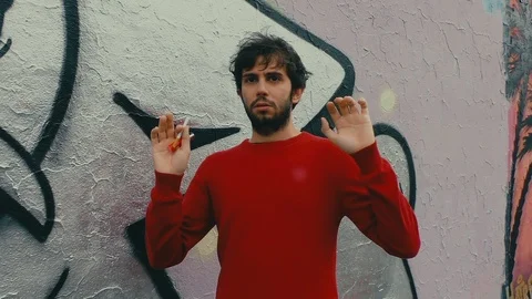 Boy Puts Hands Down and Turns Around Video stock 87201444