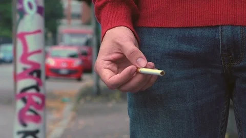 Boy Quickly Moving Cigarette Video stock 87199748