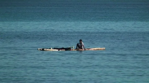 Boy on raft #1 Stock Footage 637135