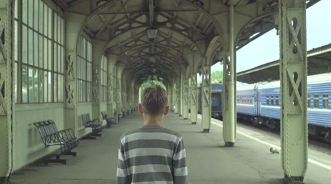 Boy On The Rail Station Stock Footage 64897570