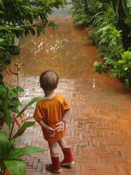 Boy in rain 스톡 사진