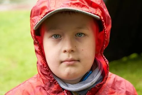 Boy in raincoat Stock Photos