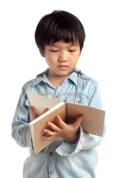 Boy reading book Stock Photos