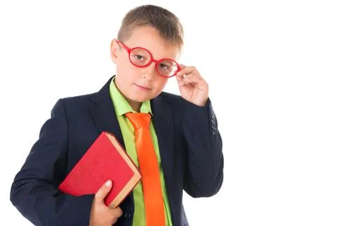 Boy reading a book thirsty for knowledge - isolated over a white background Stock Photos
