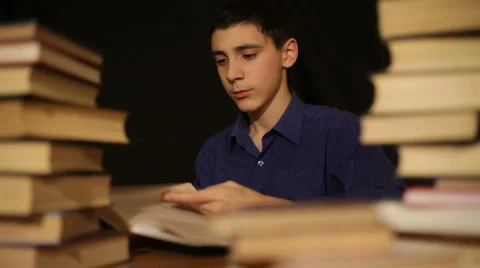 Boy reads books Video stock 906133