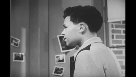 A boy realizes he needs to learn to take criticism well in order to improve his Stock Footage 116998106