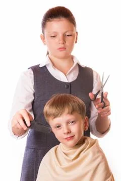 Boy at a reception at the barber Stock Photos