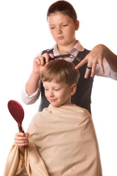 Boy at a reception at the barber Foto stock