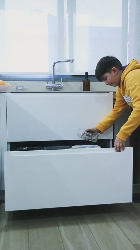 Boy reclying home bins Video stock 326826398