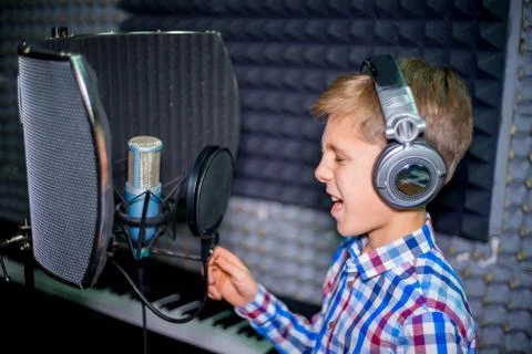 Boy in a recording studio Stock Photos