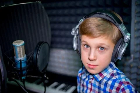 Boy in a recording studio Stock Photos