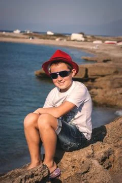 The boy in a red hat Stock Photos