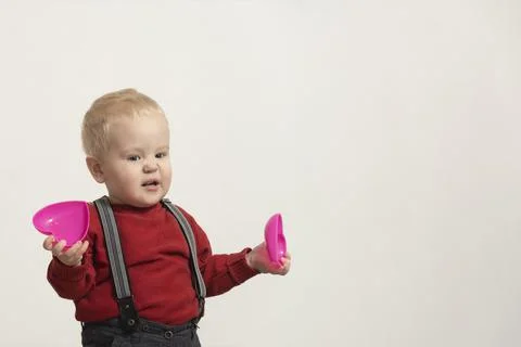 Boy in a red jacket breaking hearts Stock Photos