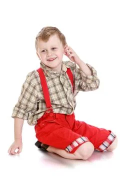 Boy in red pants Stock Photos