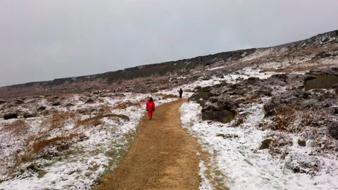Boy in red running up a path Video stock 148165771