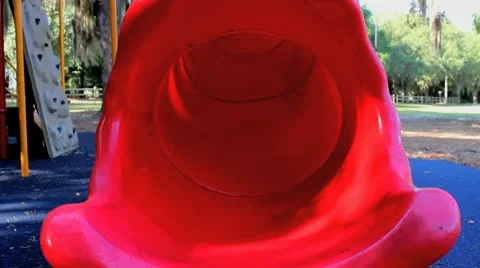Boy on Red Slide Playground Stock Footage 8986088