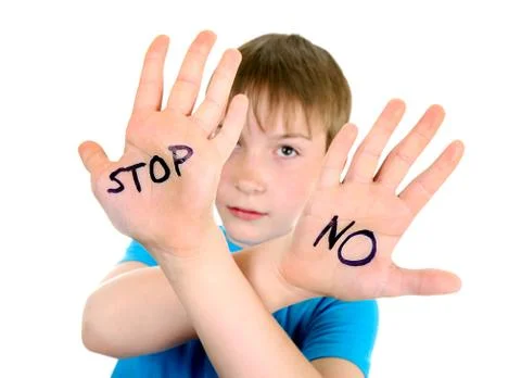 Boy with refusal gesture Fotos Stock