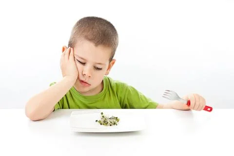 Boy refuses to eating Stock Photos