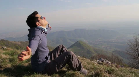 Boy relaxes and lulled by the wind Stock Footage 50053161