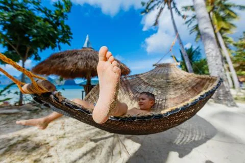 Boy relaxing on a beach 写真素材