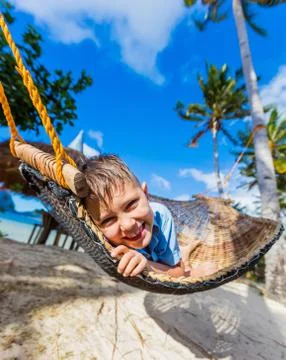 Boy relaxing on a beach Foto stock