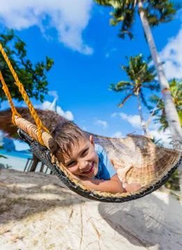 Boy relaxing on a beach 写真素材