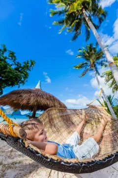 Boy relaxing on a beach Fotos de archivo