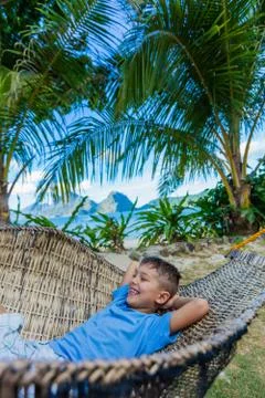 Boy relaxing on a beach Stock-Fotos