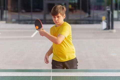 Boy Returning Ping Pong Ball Horizontal Stockfoto's