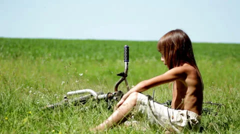 Boy ride on the field Stock Footage 25042391