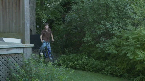 Boy Rides Bike Stockbeeldmateriaal 160466