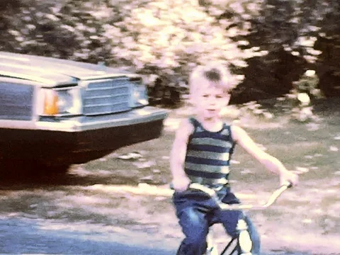 Boy Rides Bike Stock Footage 78005086