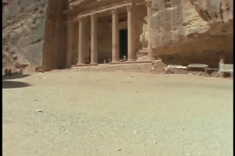 A boy rides a donkey in Petra, Jordan. Stock Footage