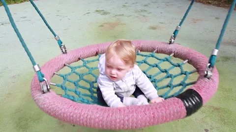 A boy rides in a hammock Video stock 134256536