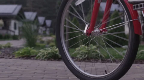 Boy rides a red bicycle Stock Footage 62758472