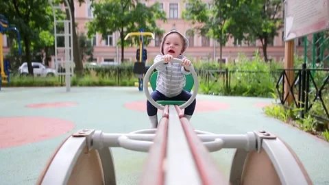 A boy rides a swing Stock Footage 134256590