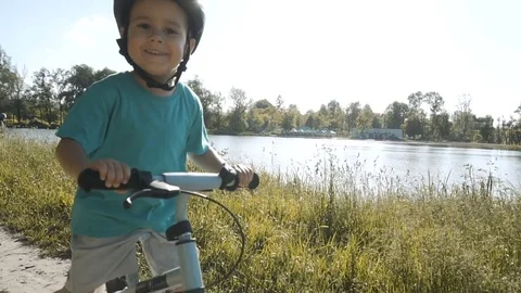 Boy Riding Bicycle Видео 76246049