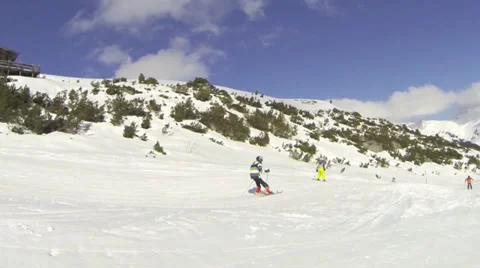 Boy riding rippled piste Stock Footage 35011670