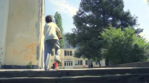 Boy riding scooter Stock Footage 63405669